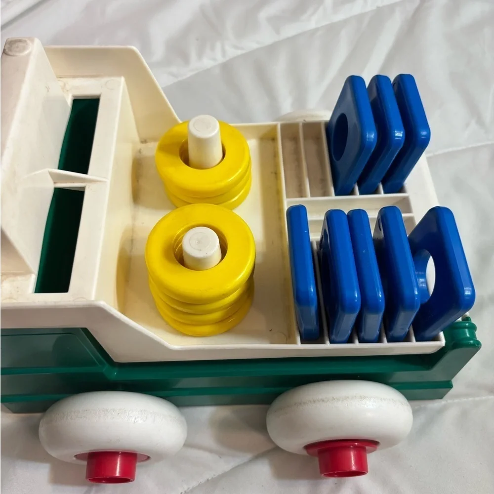 Vintage 1983 Johnson & Johnson Stack And Dump Lift Truck Vehicle with 15 Shapes